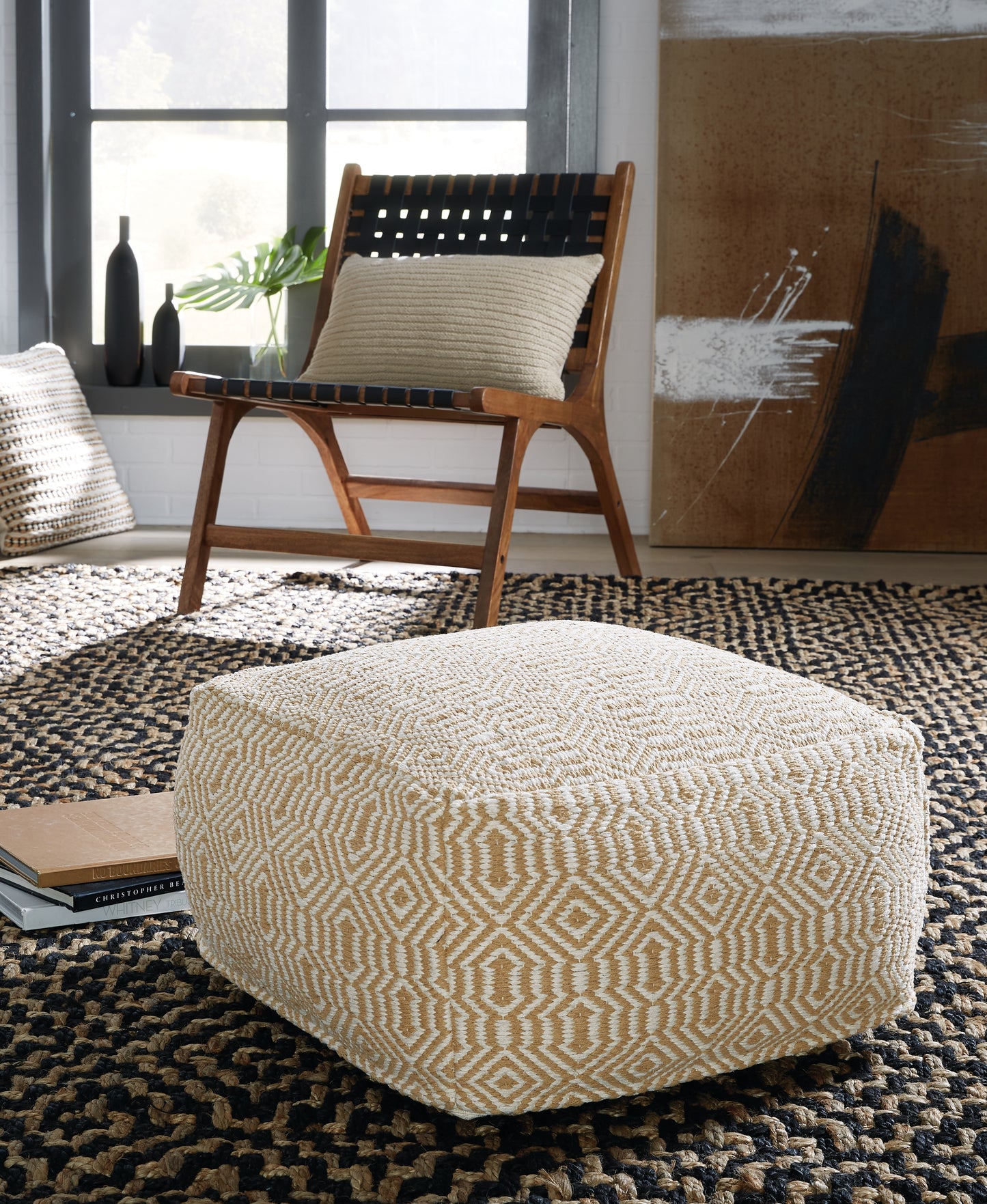 Cape Furniture Outlet - Ashley Furniture - Adamont Pouf - Pouf / Tan/Ivory - A1001059