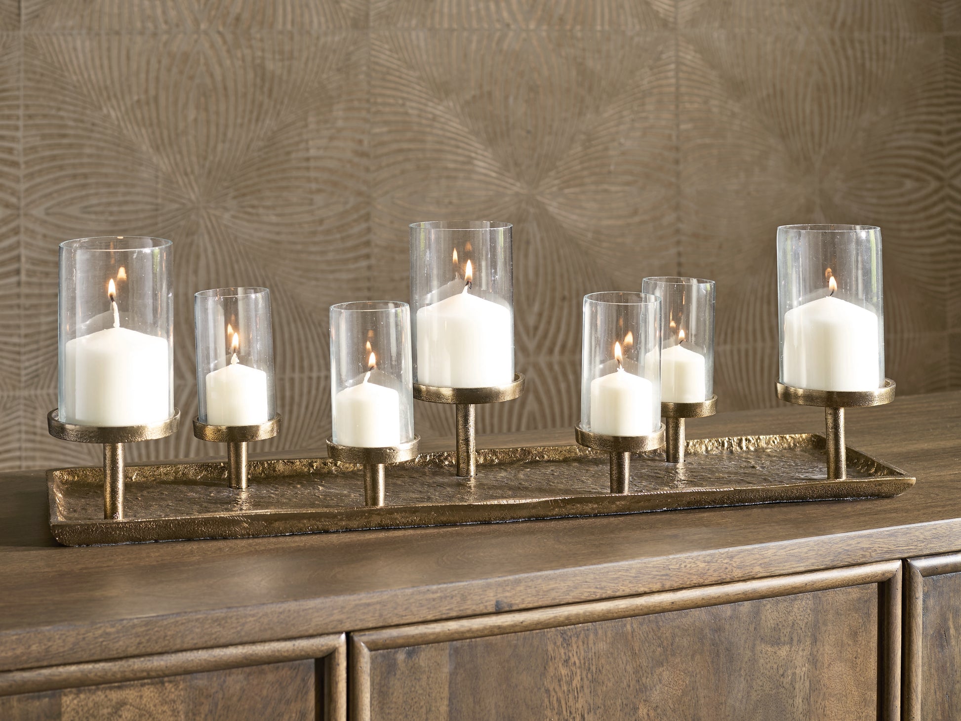 Cape Furniture Outlet - Ashley Furniture - Wallmond Candle Holder - Candle Holder / Antique Brass Finish - A2000820