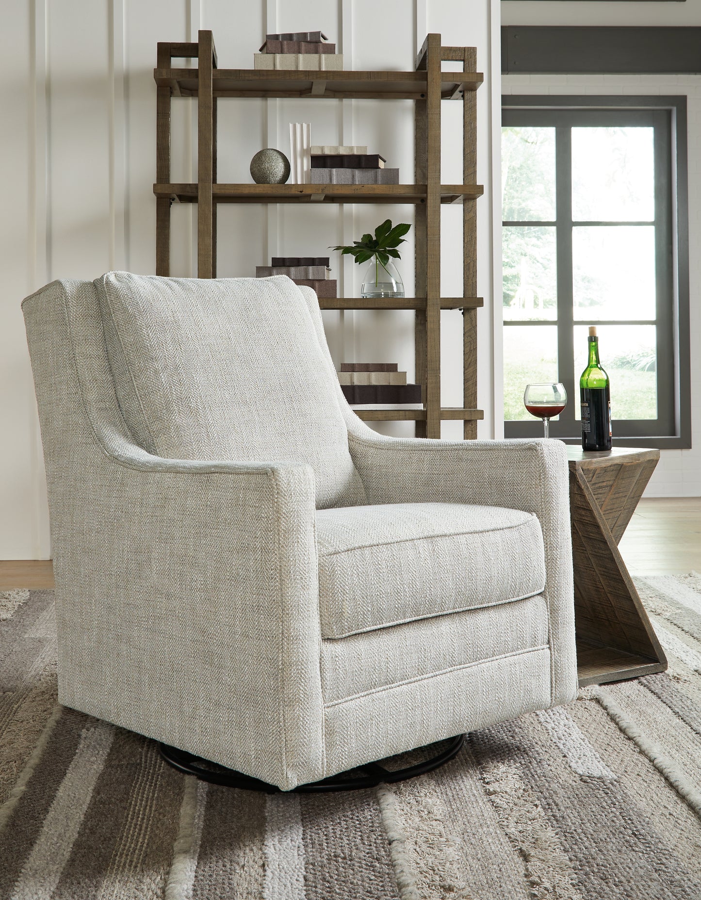 Cape Furniture Outlet - Ashley Furniture - Kambria Swivel Glider Accent Chair - Swivel Glider Accent Chair / Fog - A3000265
