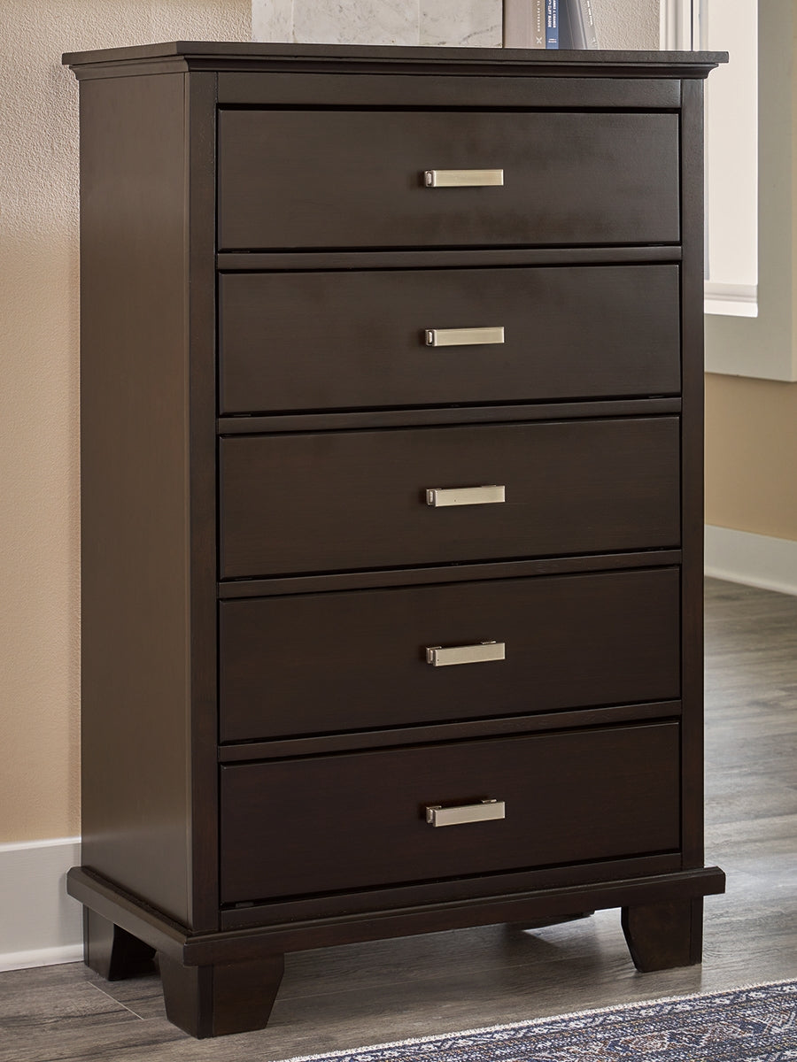 Cape Furniture Outlet - Ashley Furniture - Covetown Bedroom - Five Drawer Chest / Dark Brown - B441-46