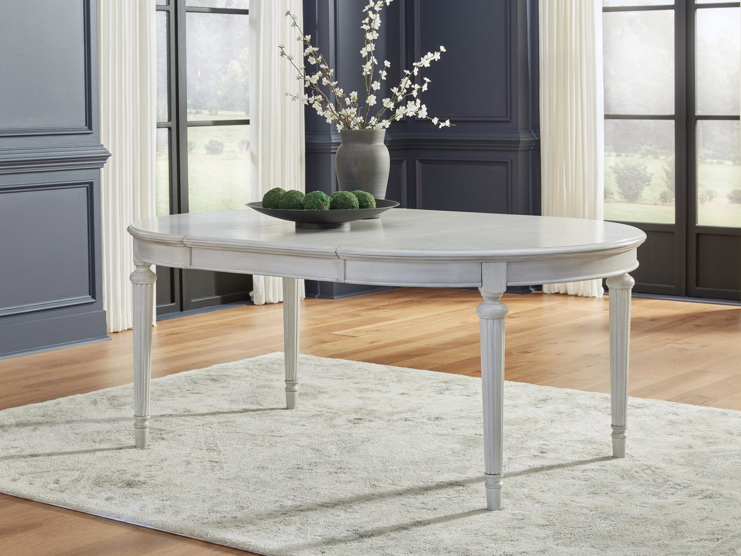 Cape Furniture Outlet - Ashley Furniture - Montelaine Dining Room - Oval Dining Room EXT Table / Antique White - D795-35