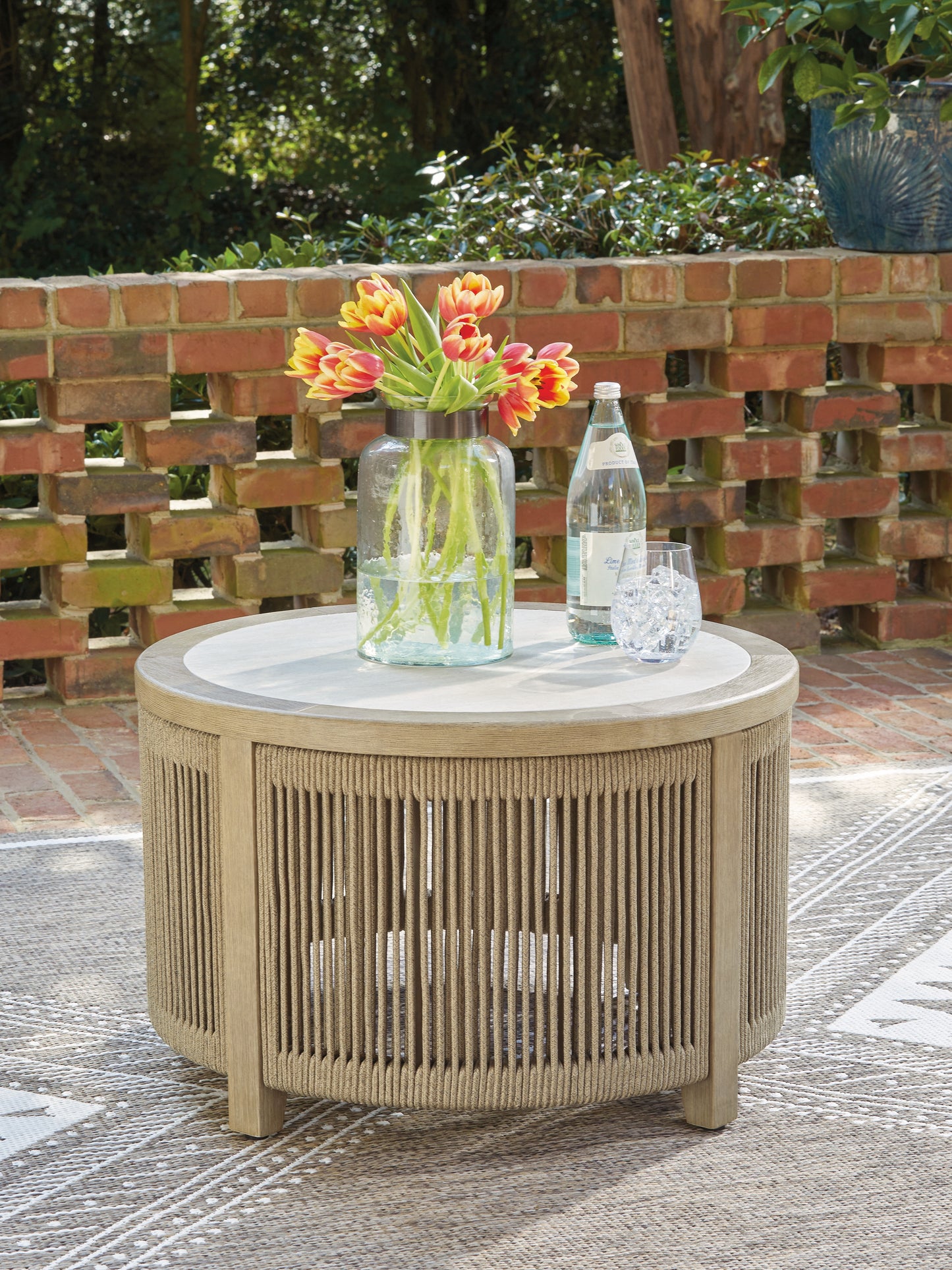 Cape Furniture Outlet - Ashley Furniture - Spooners Cove Outdoor - Round Cocktail Table / Beige - PCP469-708