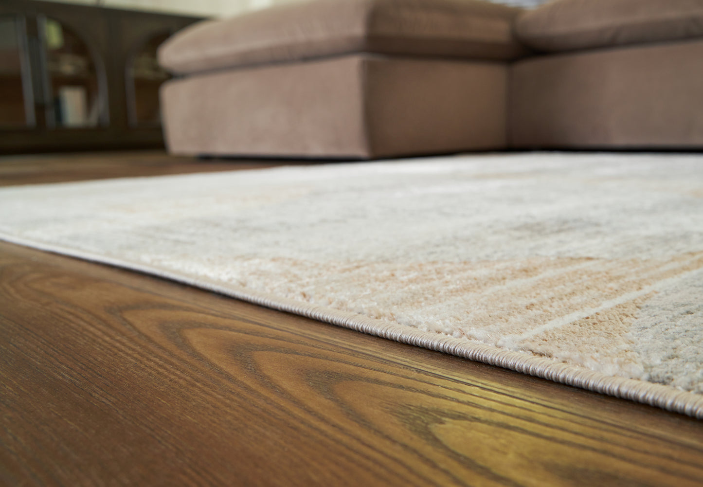 Cape Furniture Outlet - Ashley Furniture - Truward Rug - 8' x 10' Rug / Linen/Gray/Caramel - R406471