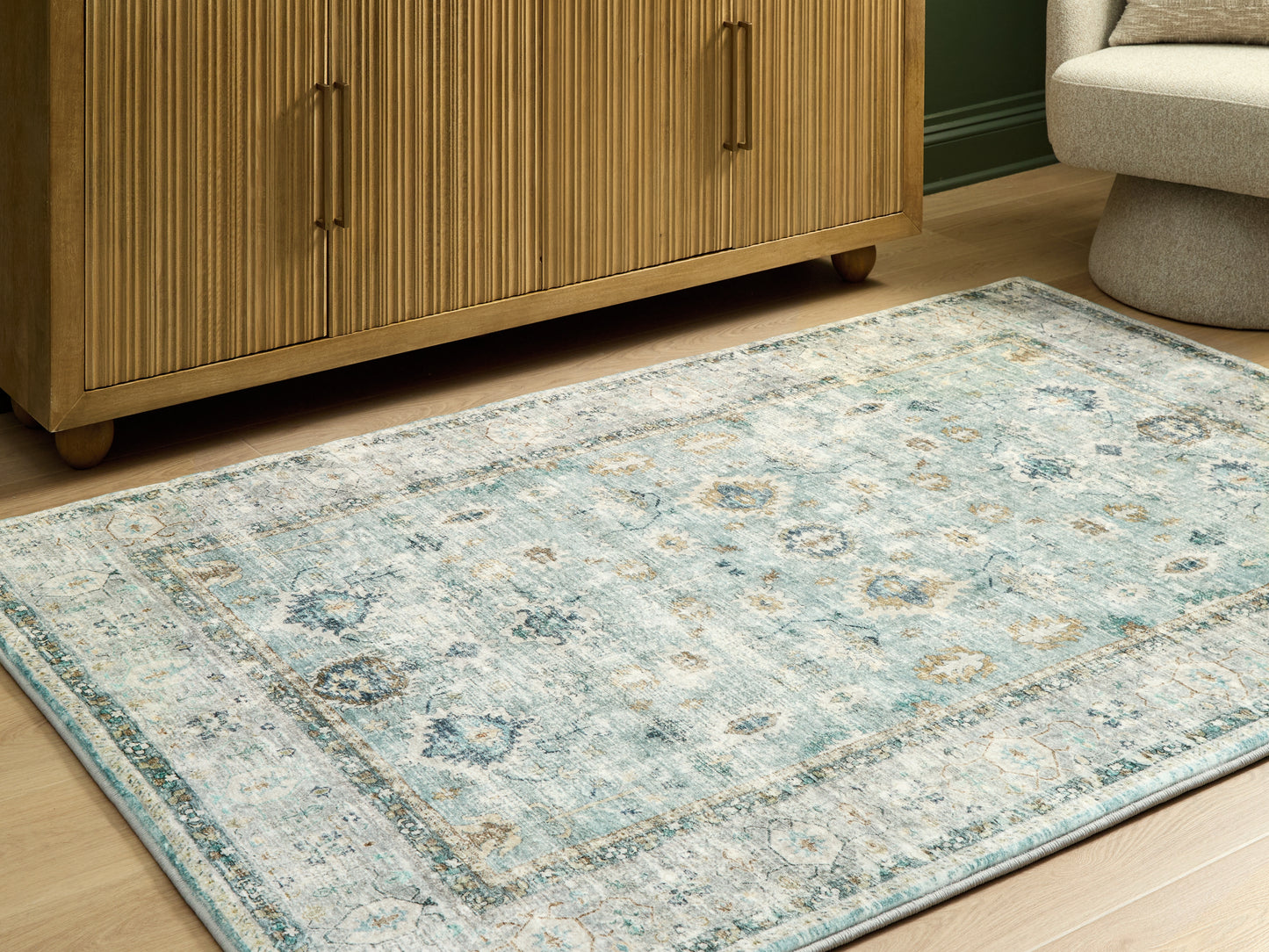 Cape Furniture Outlet - Ashley Furniture - Ladstoney Rug - 5' x 7' Area Rug / Teal/Beige/Ochre - R407502