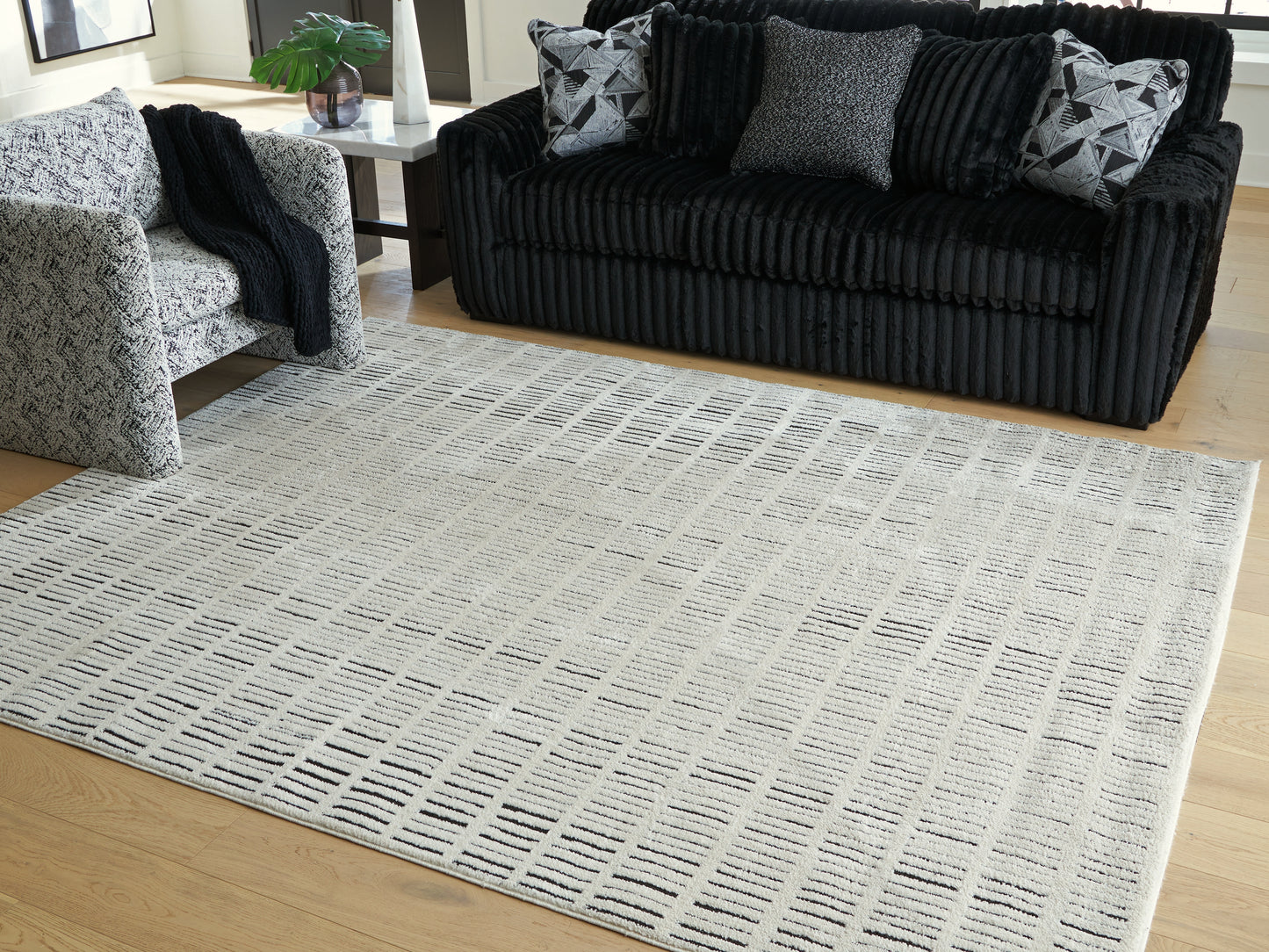 Cape Furniture Outlet - Ashley Furniture - Turinwith Rug - 7'10" x 9'10" Area Rug / Ivory/Black - R407551