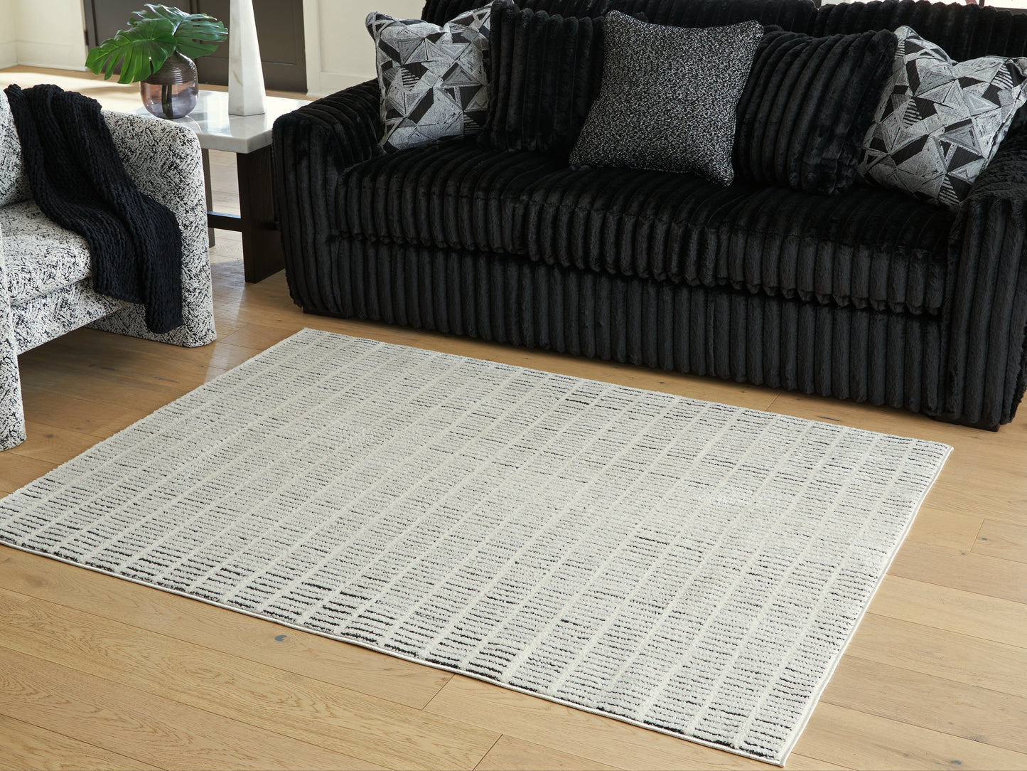 Cape Furniture Outlet - Ashley Furniture - Turinwith Rug - 5'3" x 7' Area Rug / Ivory/Black - R407552