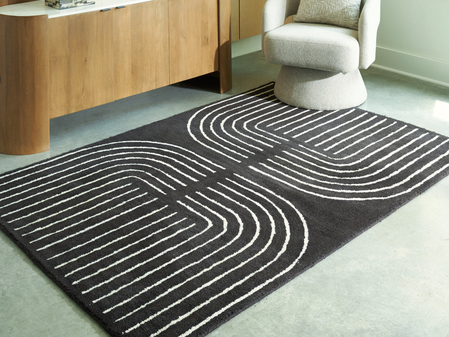 Cape Furniture Outlet - Ashley Furniture - Eldonmore Rug - 5' x 7' Area Rug / Black/Ivory - R407572