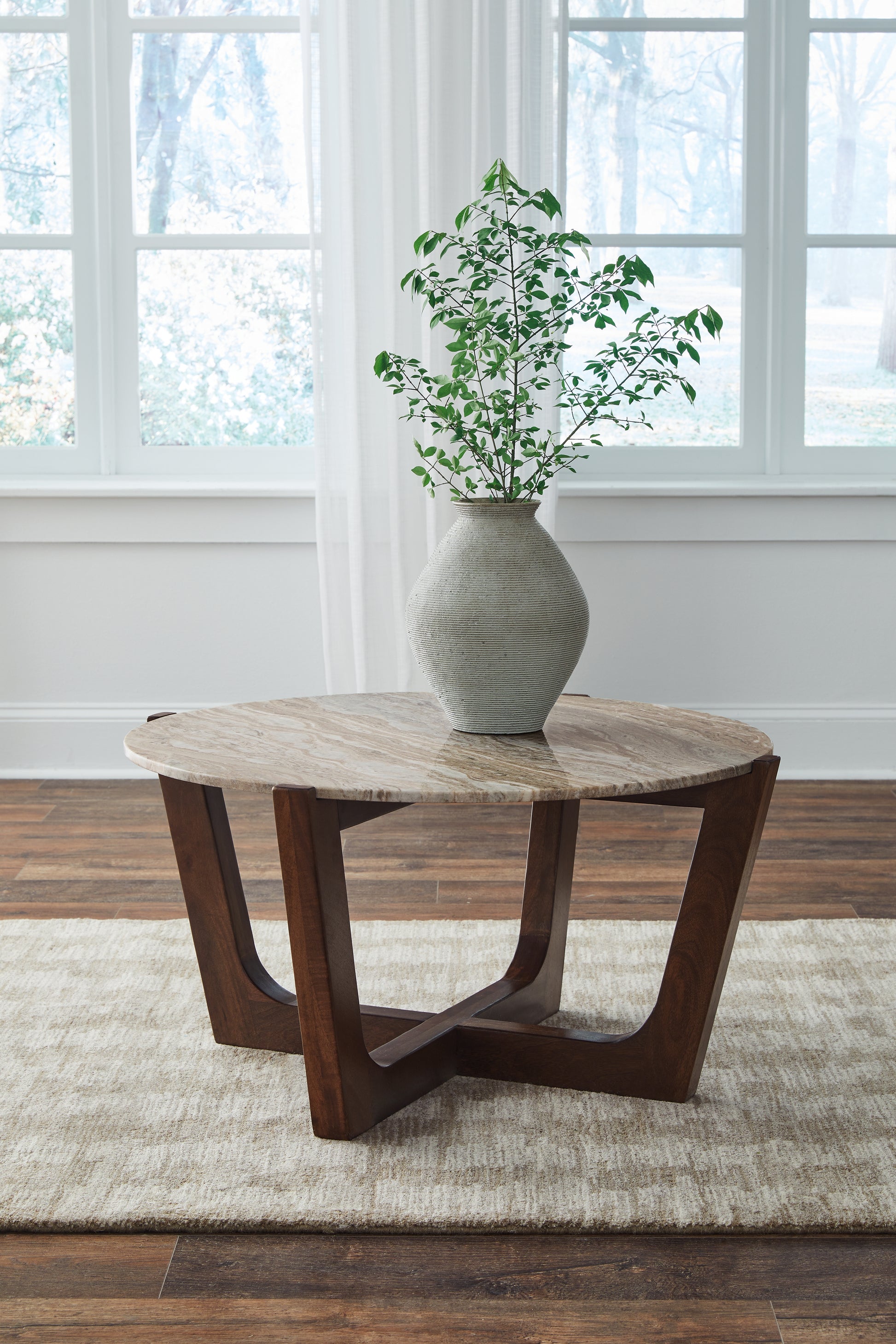 Cape Furniture Outlet - Ashley Furniture - Tanidore Coffee Table - Round Cocktail Table / Warm Brown - T667-8