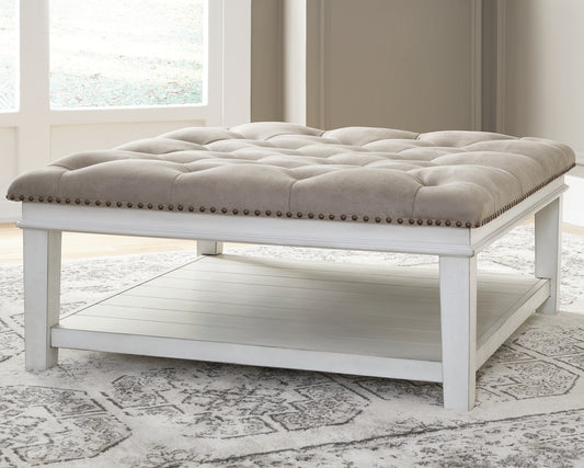 Cape Furniture Outlet - Ashley Furniture - Kanwyn Upholstered Ottoman Coffee Table - UPH Ottoman Cocktail Table / Whitewash - T937-21
