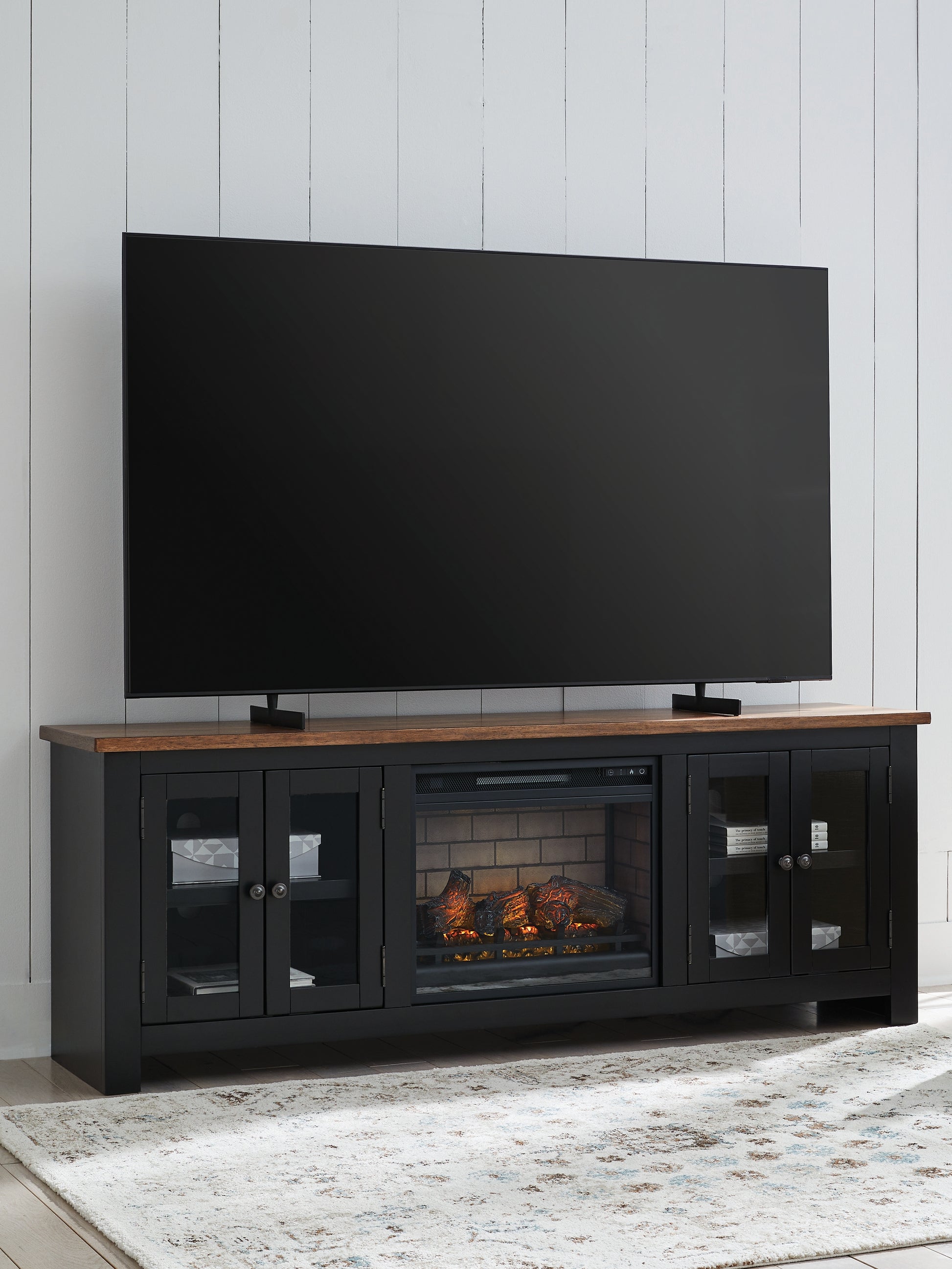 Cape Furniture Outlet - Ashley Furniture - Wildenauer 76" TV Stand with Electric Fireplace - 76" TV Stand with Electric Fireplace / Brown/Black - W664W1