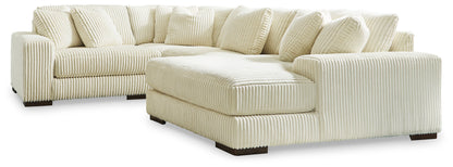 Cape Furniture Outlet - Ashley Furniture - Lindyn Sectional - RAF 4-Piece Sectional with Chaise / Ivory - 21104S15