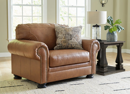 Cape Furniture Outlet - Ashley Furniture - Carianna Living Room - Chair and a Half / Caramel - 5760423