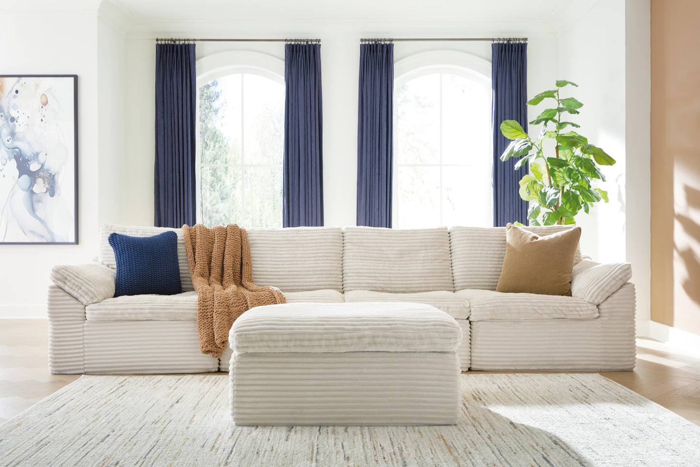 Cape Furniture Outlet - Ashley Furniture - Fannin Sectional - RAF 4-Piece Sectional with Ottoman / Ivory - PC84304S1