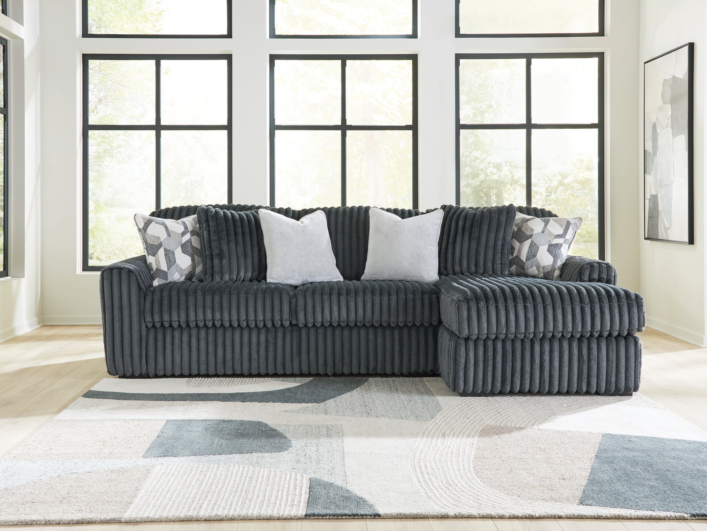 Cape Furniture Outlet - Ashley Furniture - Midnight-Madness Sectional - LAF 2-Piece Sectional Sofa Chaise / Gunmetal - 98105S3