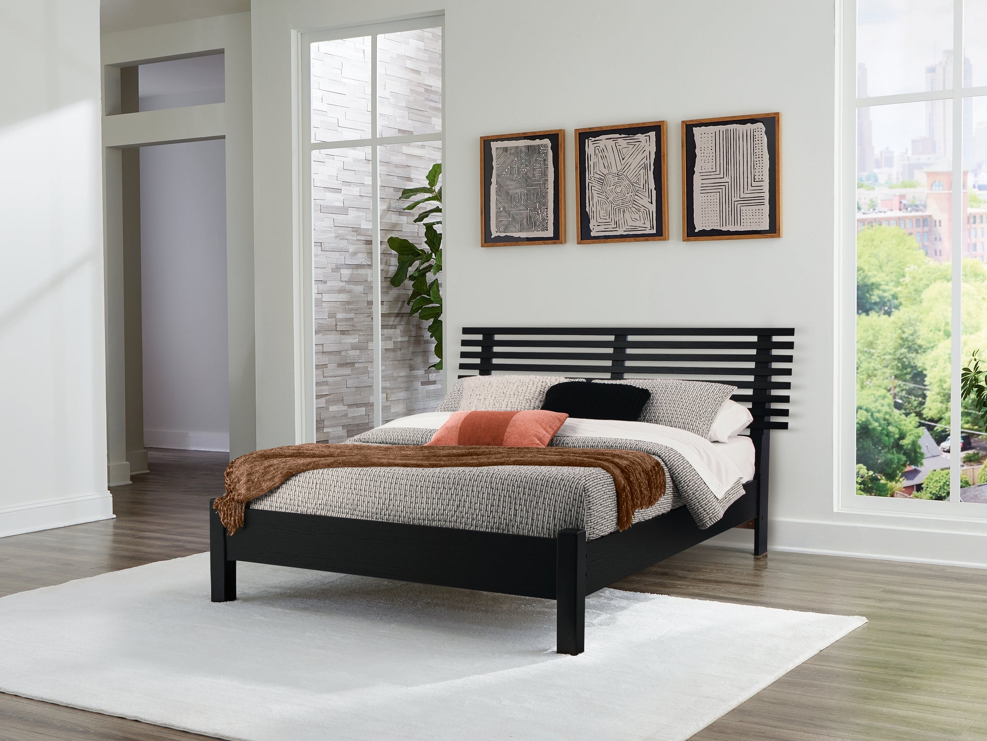Cape Furniture Outlet - Ashley Furniture - Danziar Bedroom - Queen Slat Panel Bed / Black - B1013B1