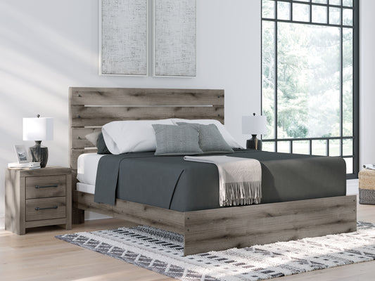 Cape Furniture Outlet - Ashley Furniture - Graystorm Bedroom - Queen Panel Bed / Brown Gray - PCB2405B2