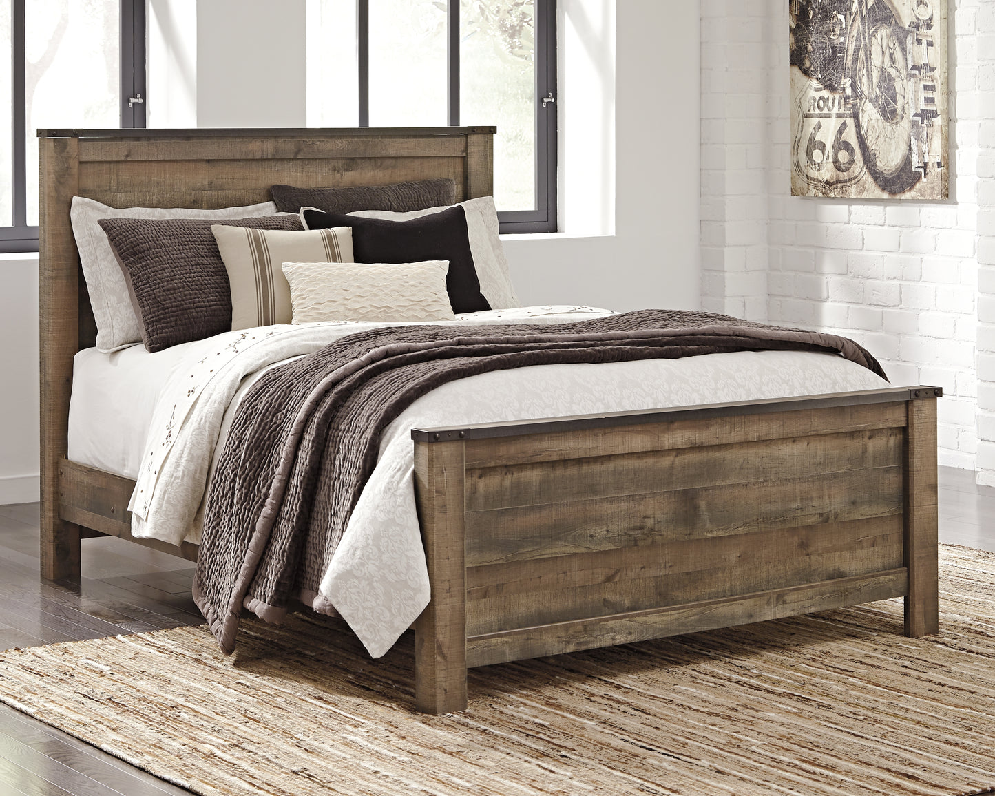 Cape Furniture Outlet - Ashley Furniture - Trinell Bedroom - Queen Panel Bed / Brown - B446B11