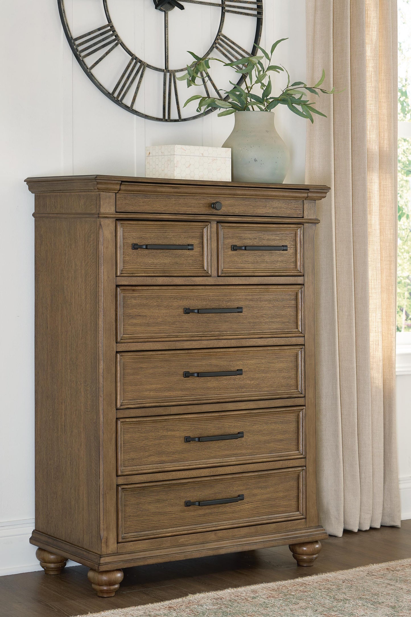 Cape Furniture Outlet - Ashley Furniture - Karallin Bedroom - Seven Drawer Chest / Medium Brown - PCB782-46