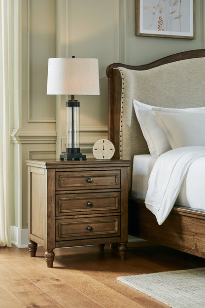 Cape Furniture Outlet - Ashley Furniture - Sturlayne Bedroom - Three Drawer Night Stand / Brown - B787-93
