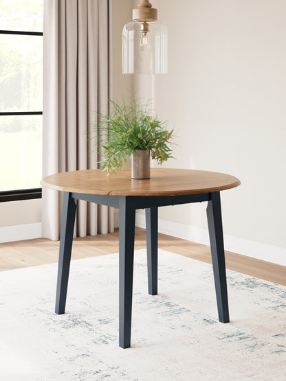 Cape Furniture Outlet - Ashley Furniture - Gesthaven Dining Room - Round DRM Drop Leaf Table / Natural/Blue - D399-15