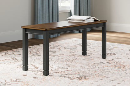 Cape Furniture Outlet - Ashley Furniture - Owingsville Dining Room - Large Dining Room Bench / Black/Brown - D580-00