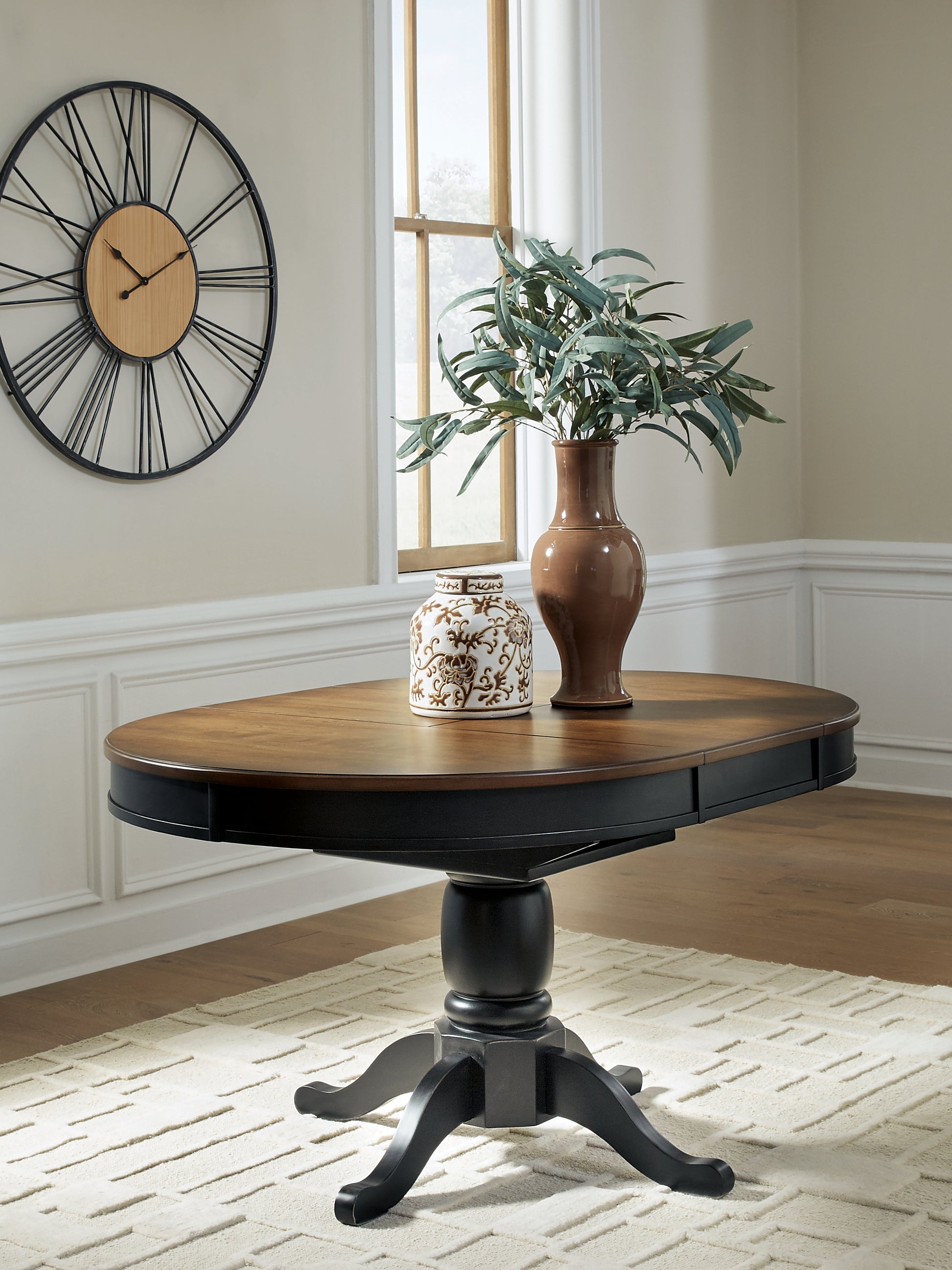 Cape Furniture Outlet - Ashley Furniture - Clorazi Dining Room - Oval DRM Butterfly EXT Table - PCD619-48