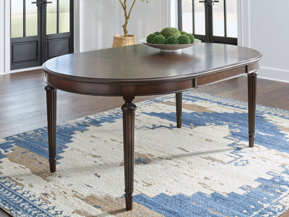 Cape Furniture Outlet - Ashley Furniture - Lavinton Dining Room - Oval Dining Room EXT Table / Brown - D764-35