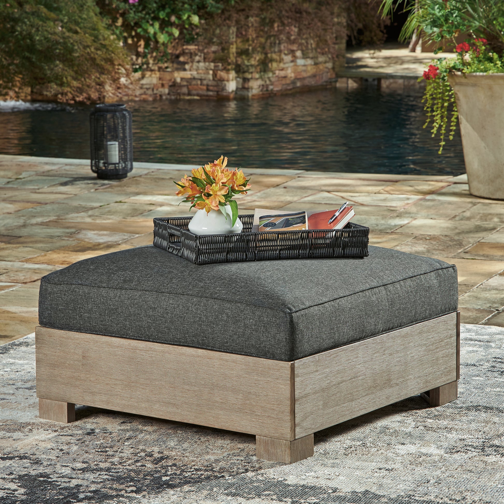 Cape Furniture Outlet - Ashley Furniture - Citrine Park Outdoor - Ottoman with Cushion / Brown/Charcoal - P660-814