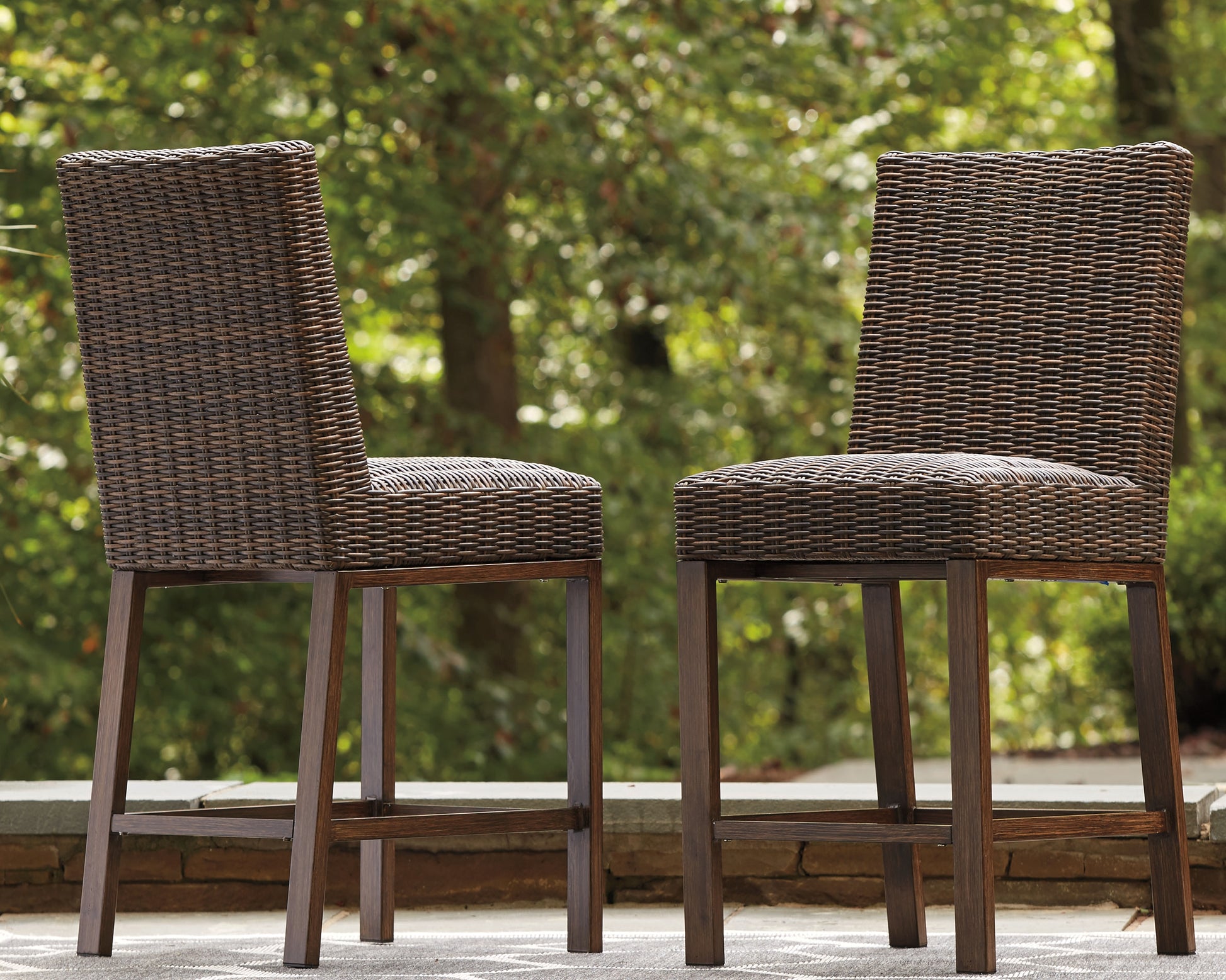 Cape Furniture Outlet - Ashley Furniture - Paradise Trail Outdoor - Barstool (Set of 2) / Medium Brown - P750-130