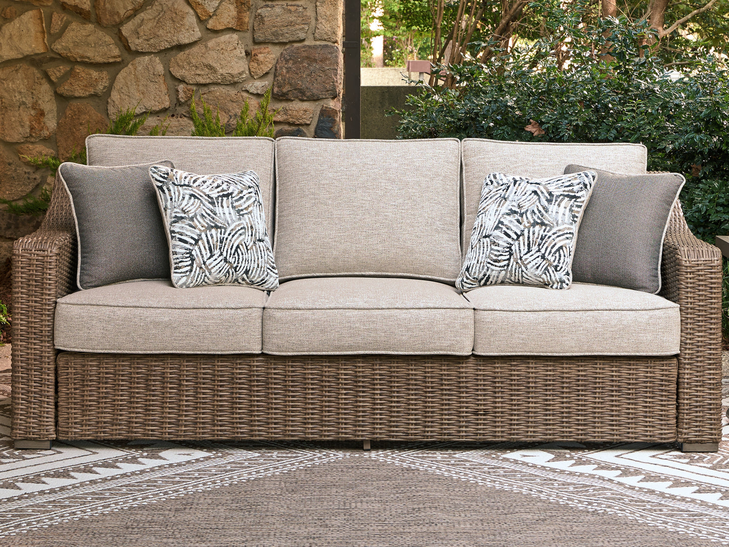 Cape Furniture Outlet - Ashley Furniture - Laguna Heights Outdoor - Sofa with Cushion / Beige - PCP790-838