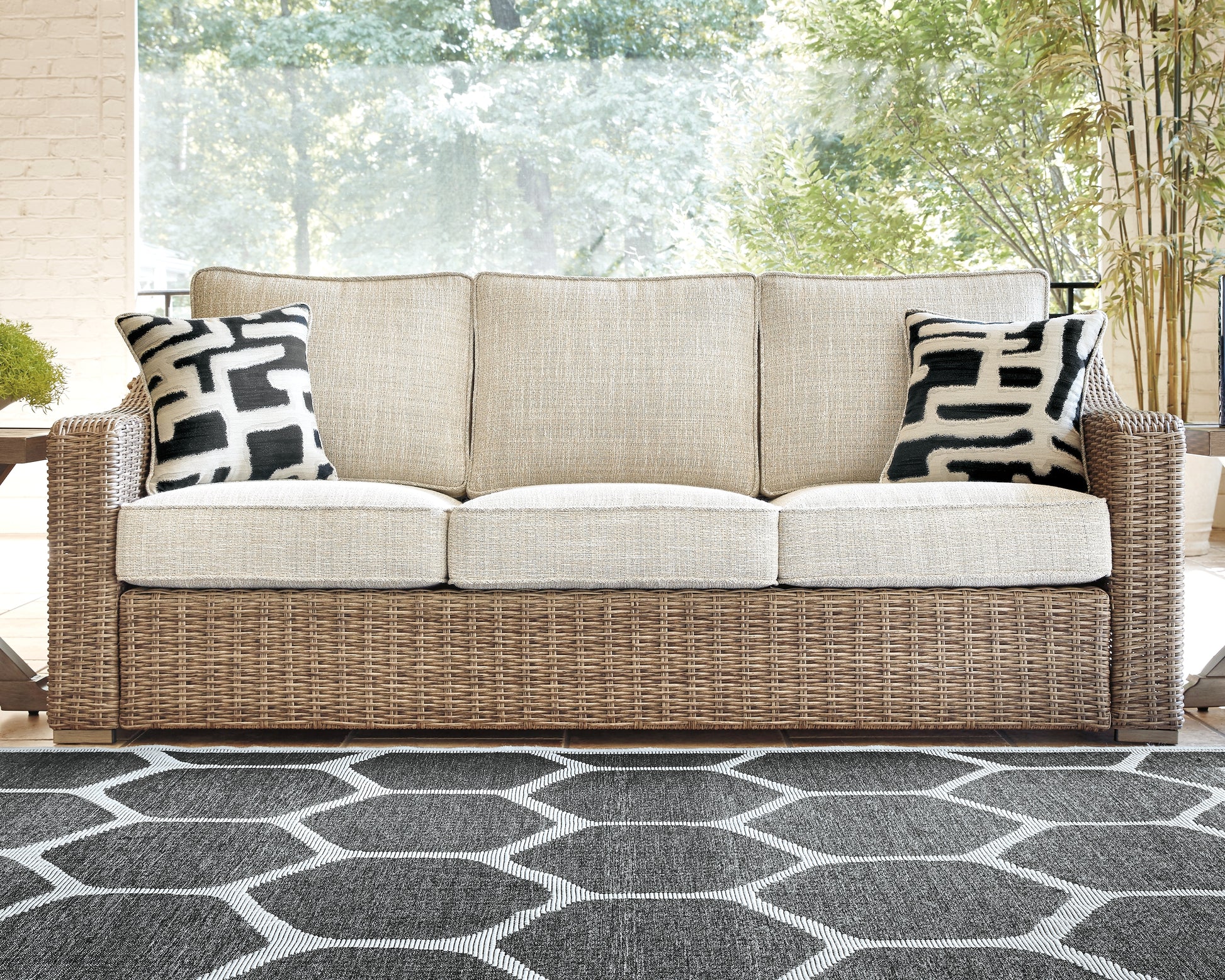 Cape Furniture Outlet - Ashley Furniture - Beachcroft Outdoor - Sofa with Cushion / Beige - P791-838