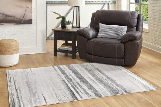 Cape Furniture Outlet - Ashley Furniture - Abanett Rug - 7'10" x 10'2" Rug / Multi - R403781