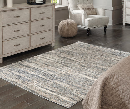 Cape Furniture Outlet - Ashley Furniture - Gizela Rug - 7'10" x 10' Rug / Ivory/Beige/Gray - R404861