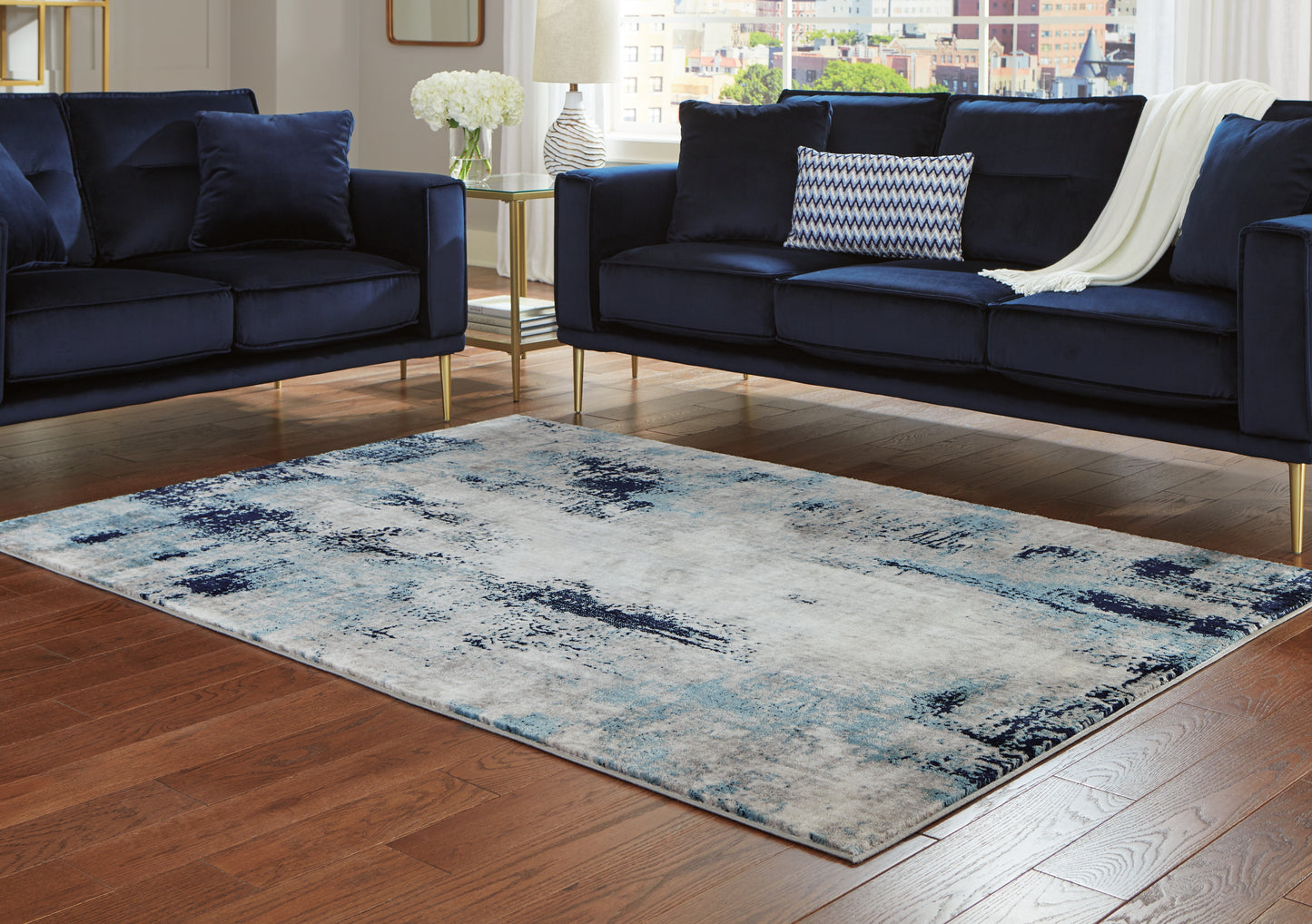 Cape Furniture Outlet - Ashley Furniture - Leonelle Rug - 7'10" x 10' Rug / White/Blue/Gray - R404871