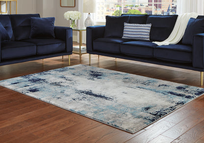 Cape Furniture Outlet - Ashley Furniture - Leonelle Rug - 7'10" x 10' Rug / White/Blue/Gray - R404871