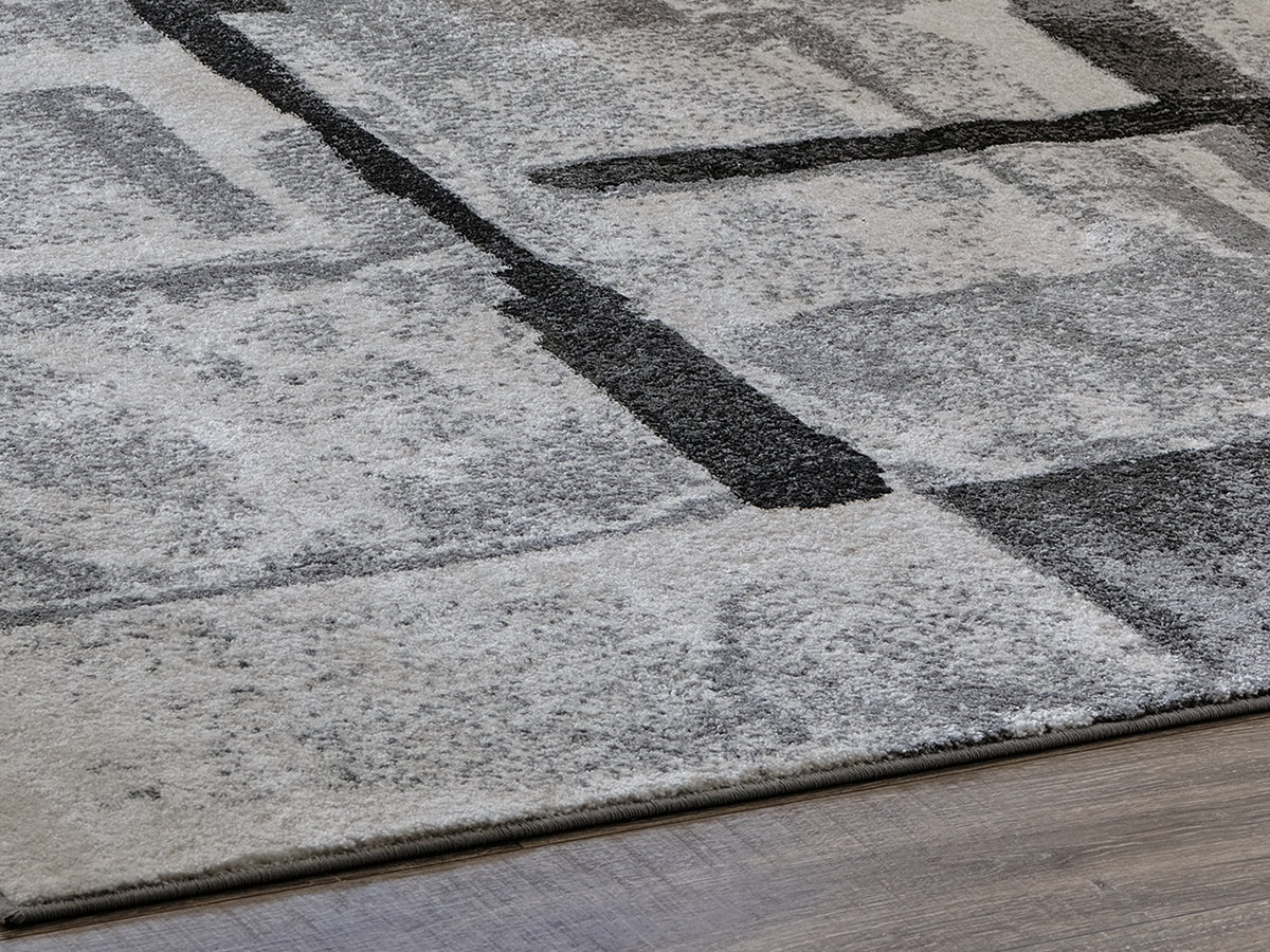 Cape Furniture Outlet - Ashley Furniture - Brycebourne Rug - 5'3" x 7'7" Rug / Black/Cream/Gray - R404982