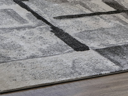 Cape Furniture Outlet - Ashley Furniture - Brycebourne Rug - 5'3" x 7'7" Rug / Black/Cream/Gray - R404982