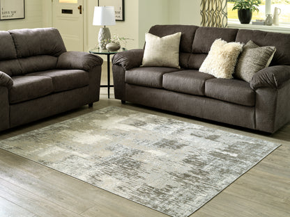 Cape Furniture Outlet - Ashley Furniture - Arriston Rug - 7'10" x 10' Washable Rug / Multi - R405561