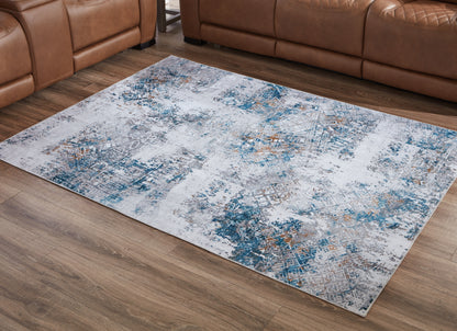 Cape Furniture Outlet - Ashley Furniture - Garyard Rug - 5' x 7' Washable Rug / Multi - R405772