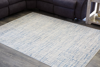 Cape Furniture Outlet - Ashley Furniture - Beckfille Rug - 8' x 10' Rug / Blue/Gray/Cream - R405961