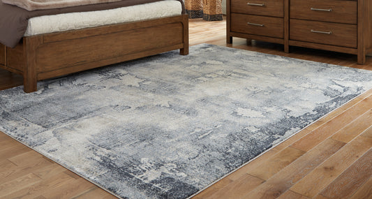 Cape Furniture Outlet - Ashley Furniture - Langrich Rug - 7'10" x 10'6" Rug / Blue/Gray/Cream - R406131