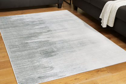 Cape Furniture Outlet - Ashley Furniture - Milset Rug - 5'1" x 6'10" Washable Rug / Black/White/Gray - R406252
