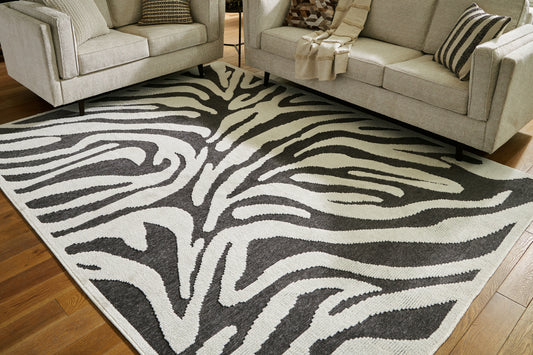 Cape Furniture Outlet - Ashley Furniture - Thomwith Rug - 8' x 10'2" Washable Rug / Black/Ivory - R406291