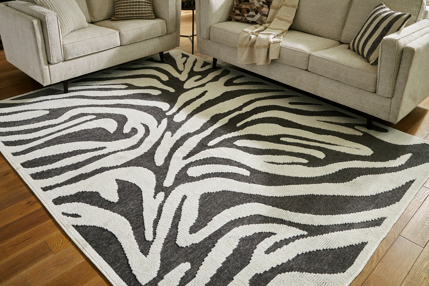 Cape Furniture Outlet - Ashley Furniture - Thomwith Rug - 8' x 10'2" Washable Rug / Black/Ivory - R406291
