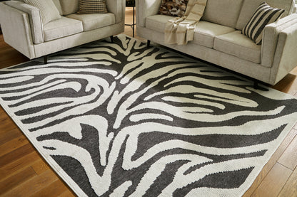 Cape Furniture Outlet - Ashley Furniture - Thomwith Rug - 8' x 10'2" Washable Rug / Black/Ivory - R406291