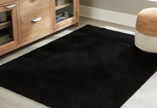 Cape Furniture Outlet - Ashley Furniture - Anaben Rug - 8' x 10'1" Washable Rug / Black - R406311