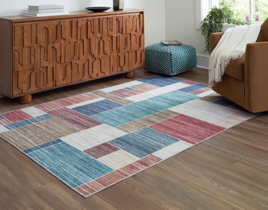 Cape Furniture Outlet - Ashley Furniture - Numore Rug - 5'2" x 6'11" Washable Rug / Multi - R406662