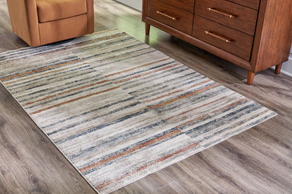 Cape Furniture Outlet - Ashley Furniture - Kemart Rug - 5' x 7' Rug / Multi - R406682