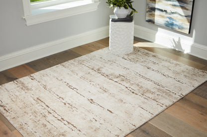 Cape Furniture Outlet - Ashley Furniture - Kasney Rug - 5' x 7' Rug / Cream/Brown - R406852