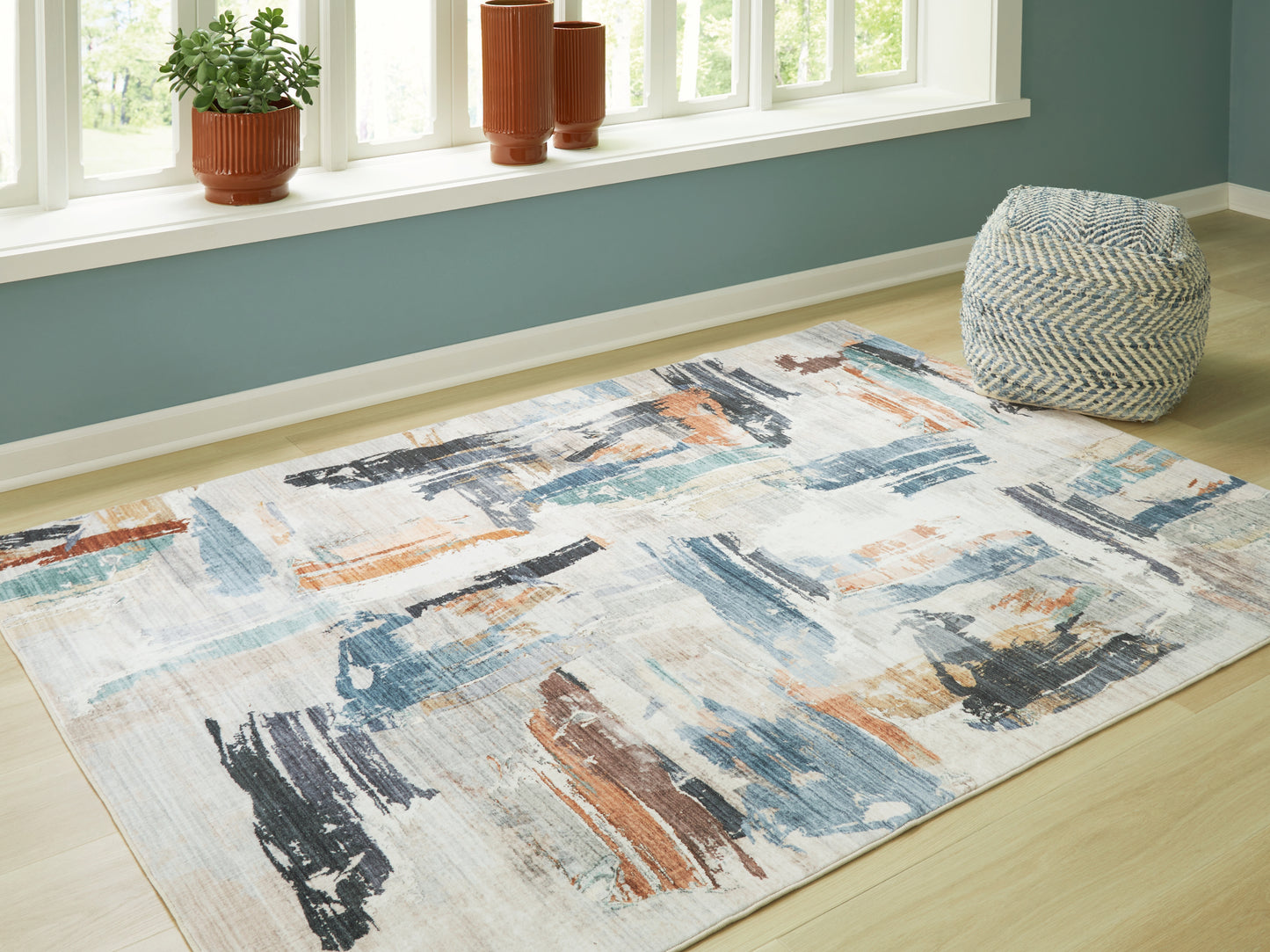 Cape Furniture Outlet - Ashley Furniture - Hessland Rug - 8' x 10' Washable Rug / Multi - R407051